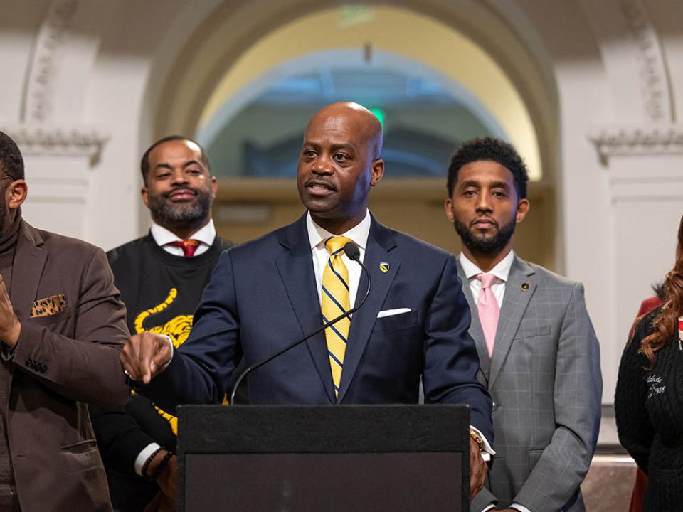 Dr. Jenkins with Mayor Scott and Nick Mosby